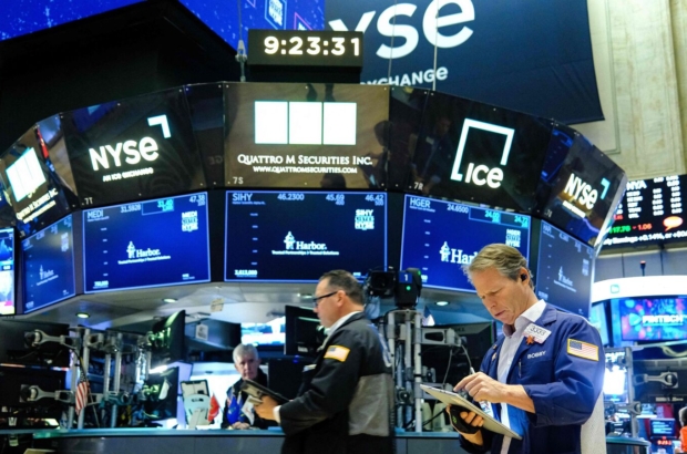 US-ECONOMY-MARKETS-NYSE-1_1765901376733_1765901402769.jpg